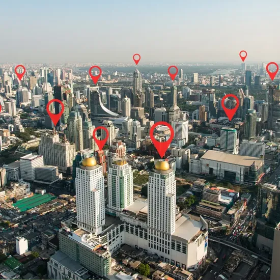 city with location icons over buildings